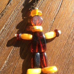 Vintage amber pendant on leather string